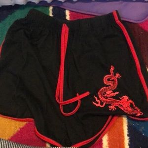 Black Chinese dragon shorts
